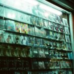 a store front with a lot of movies on display